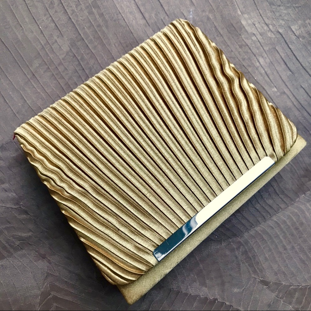 Gold “Deco” designed evening bag.